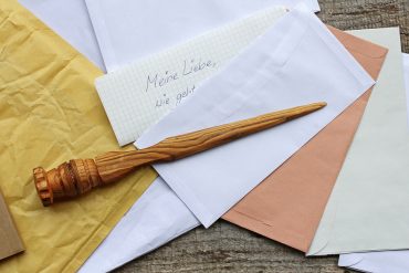 letter opener in wood and open mail iStock.com/Astrid860