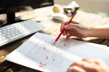 Person Marking Error With Red Marker iStock.com/AndreyPopov