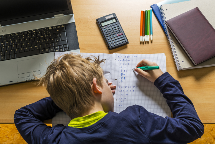 frustrated teenager doing homework